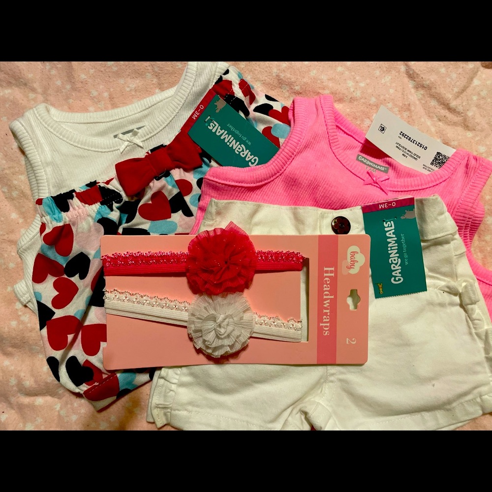 2 matching outfits (shorts) with matching hair pieces